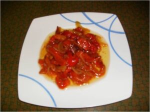 Pimientos rojos asados con comino y cebolla